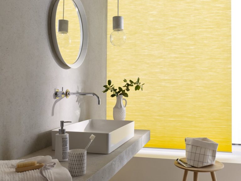 Im Badezimmer sorgen sonnige Farben für ein warmes Licht auch an kühlen Tagen